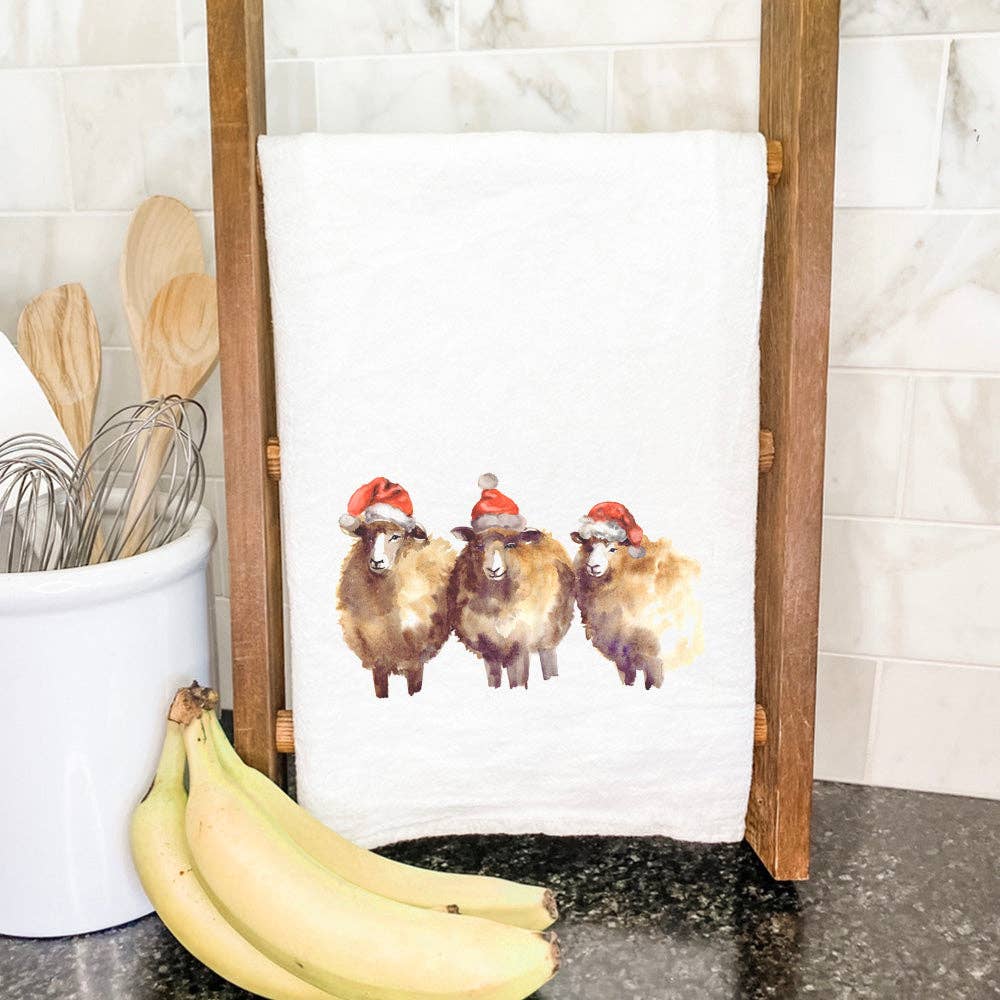 sheep w santa hats tea towel