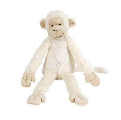 White monkey plush toy on a white background