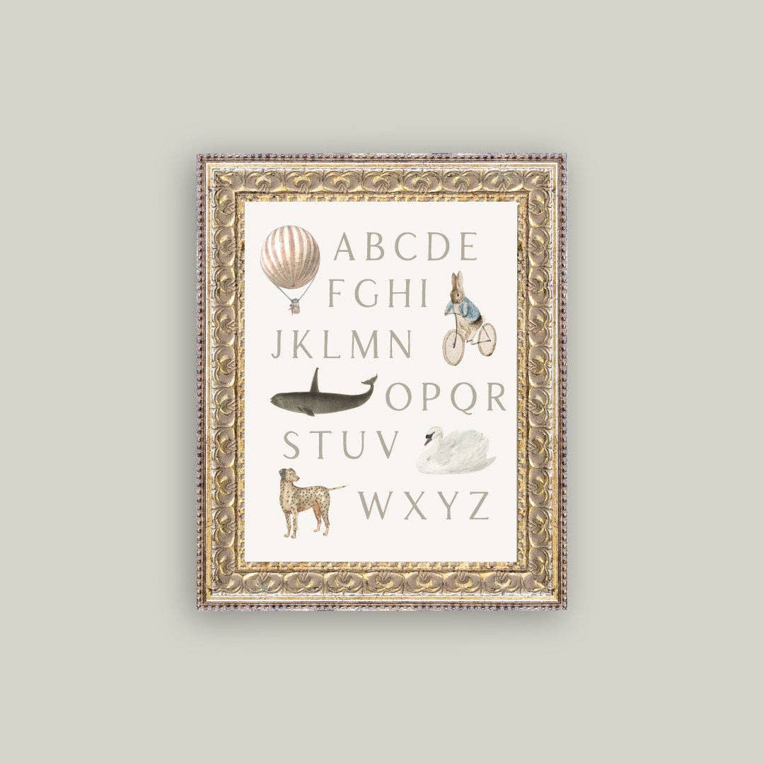 Framed alphabet poster with illustrations on a light gray background