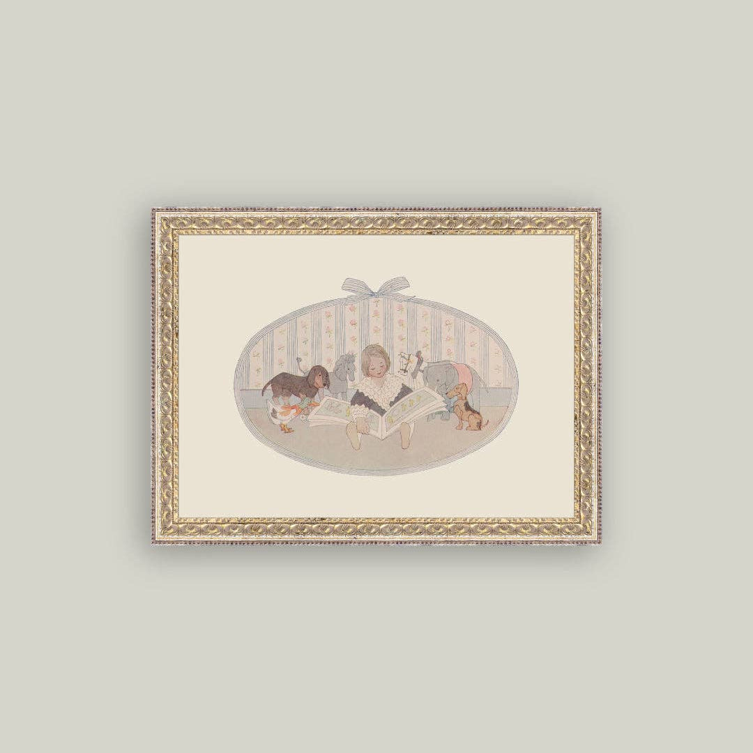 A framed art print featuring a vintage-style illustration of a woman reading to animals, enclosed in an ornate gold-toned frame against a light gray background.