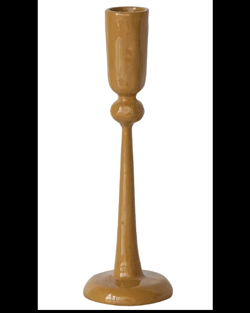 Three ceramic candlesticks in tan, off-white, and dusty coral pink, arranged side by side on a plain white background.