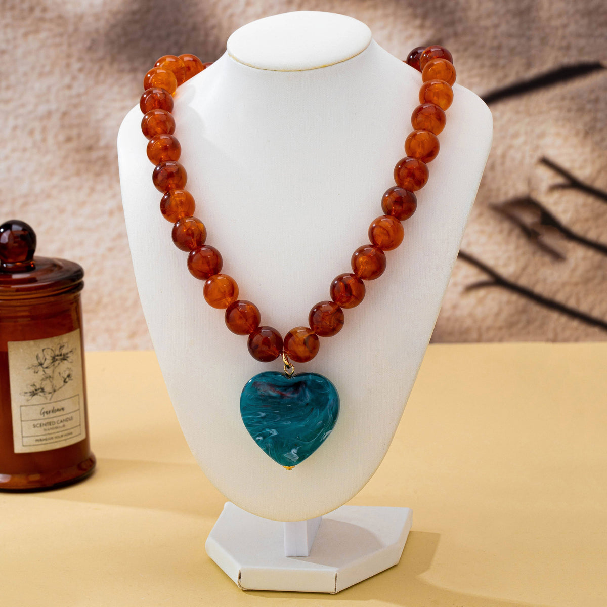 brown beaded necklace w blue heart
