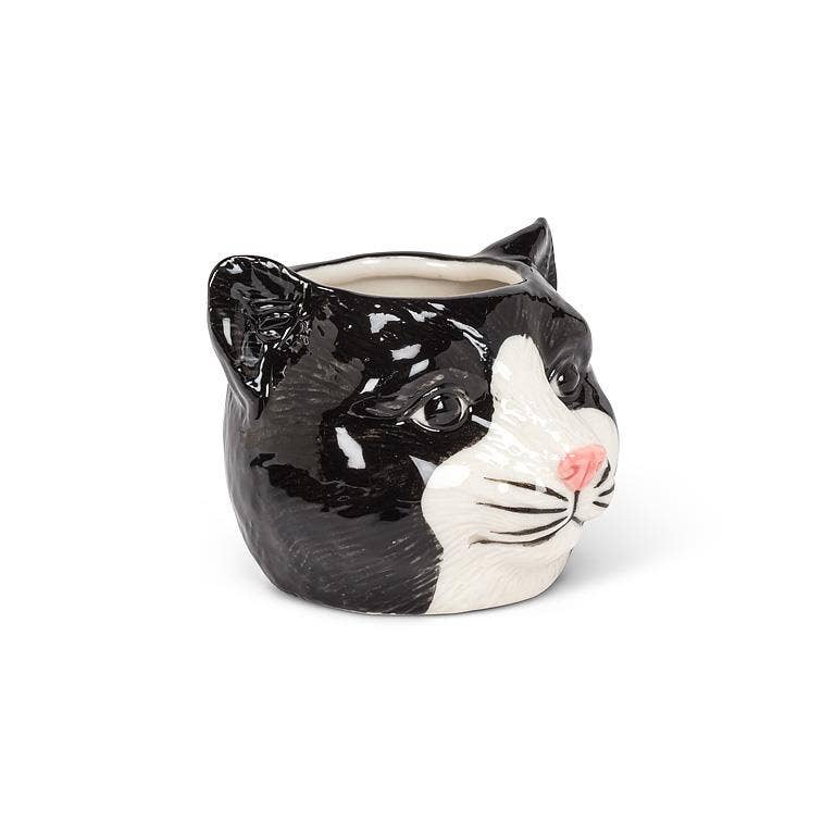 Ceramic cat-shaped planter on a white background