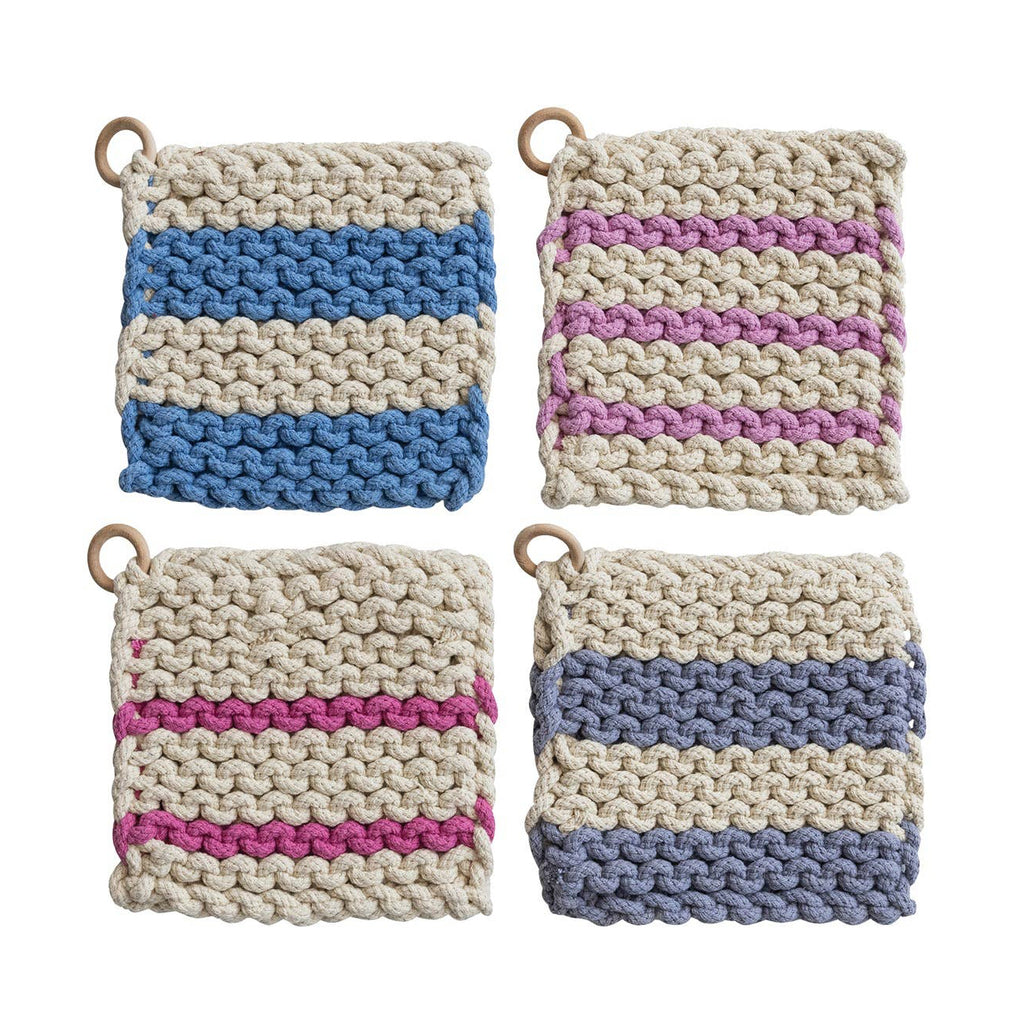 Four knitted potholders with striped patterns on a white background