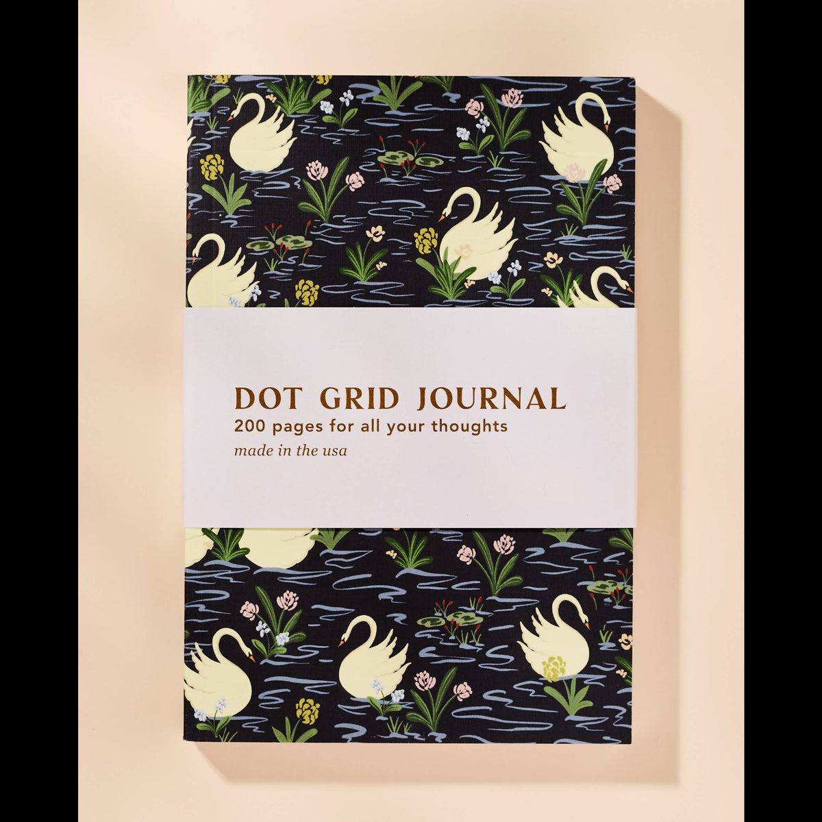 Dot grid journal with swan design on cover