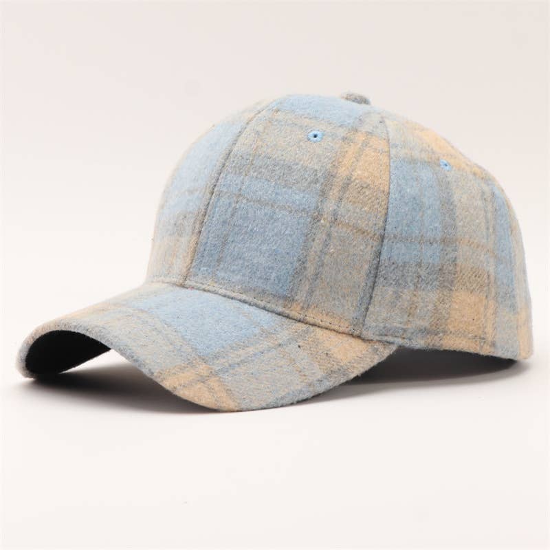 A plaid baseball cap in light blue and beige wool-like fabric, shown from a three-quarters angle on a light gray background.
