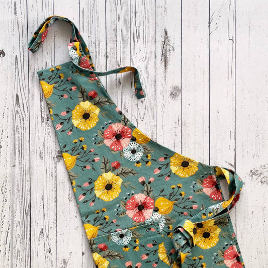 Green Apron with yellow and red flowers