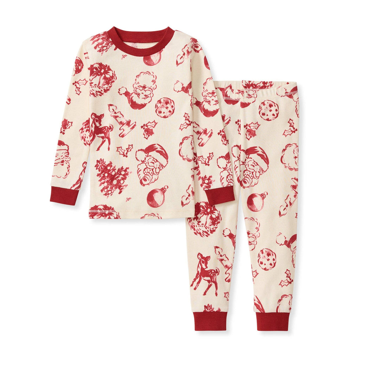 A two-piece children's pajama set featuring a long-sleeve top and matching pants in cream with a red Christmas-themed print of Santa Claus, reindeer, ornaments, and mistletoe, finished with solid red ribbed cuffs and collar.