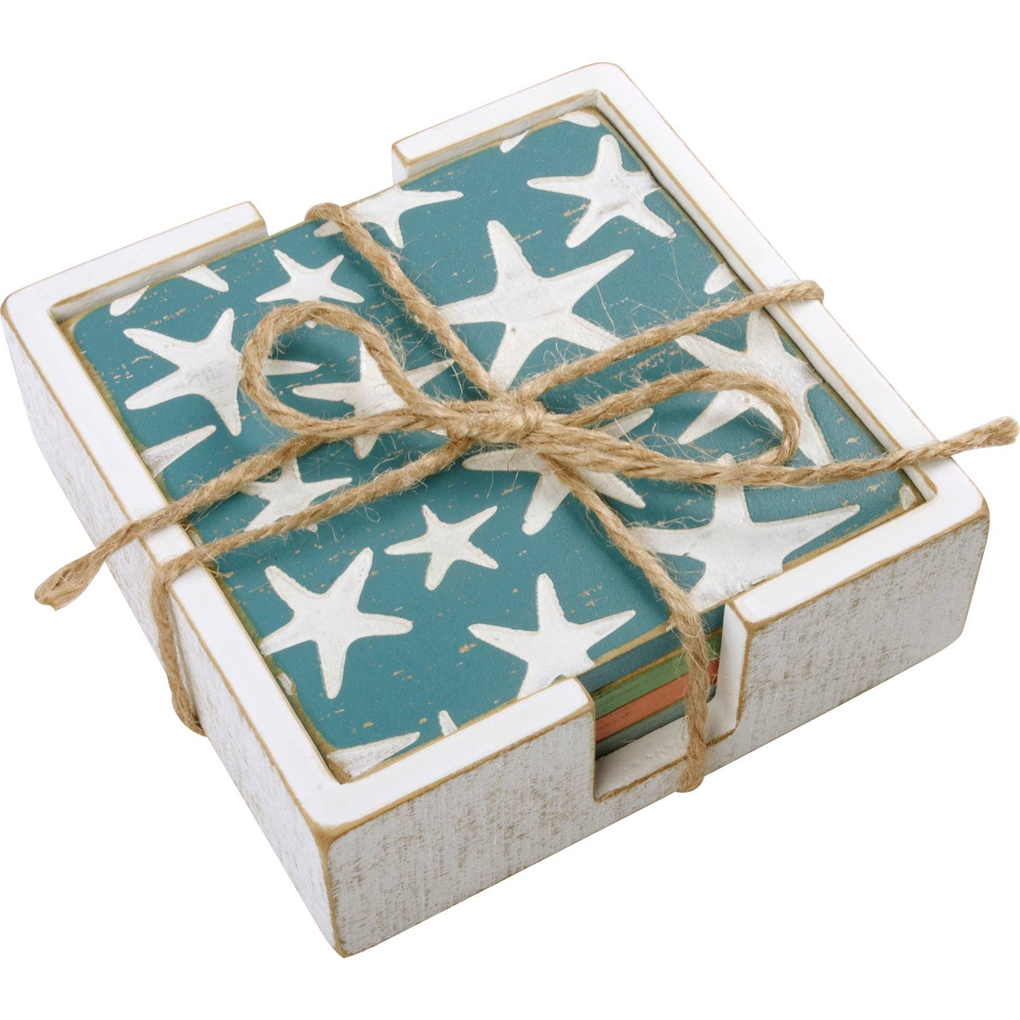 Set of coasters with starfish pattern in a box tied with twine on a white background