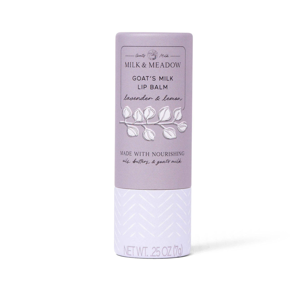 Milk & Meadow Goat's Milk Lip Balm in a lavender and white tube, featuring a botanical leaf illustration on a clean white background.