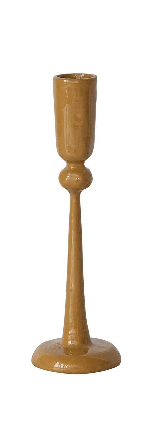 Three ceramic candlesticks in tan, off-white, and dusty coral pink, arranged side by side on a plain white background.