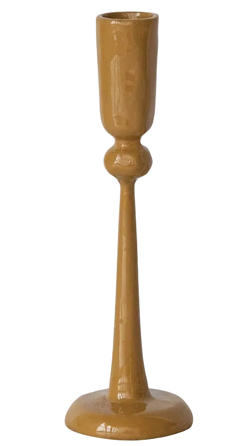 Three ceramic candlesticks in tan, off-white, and dusty coral pink, arranged side by side on a plain white background.