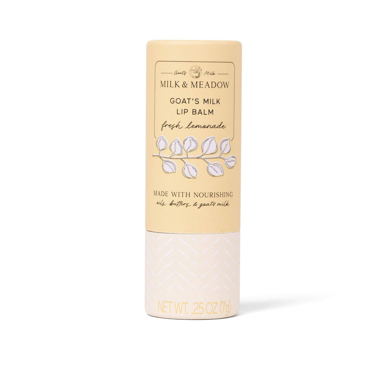 Milk & Meadow Goat's Milk Lip Balm in Fresh Lemonade scent, shown in a 2.5 oz cylindrical tube with a cream-colored label and patterned lower section on a white background.