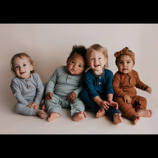 babies with playsuits on
