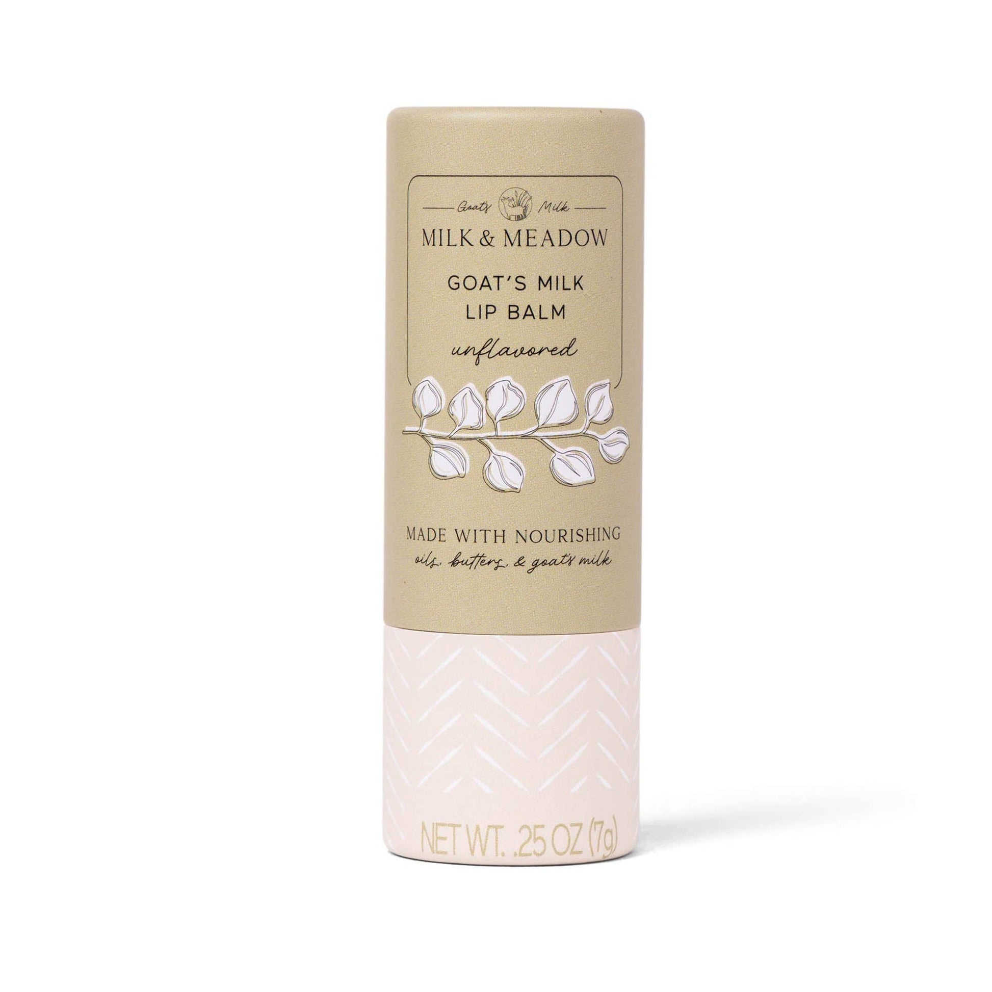 Milk & Meadow Goat's Milk Lip Balm in Island Coconut scent, shown in a cylindrical cardboard tube with a beige top and a pale pink patterned bottom, on a white background.