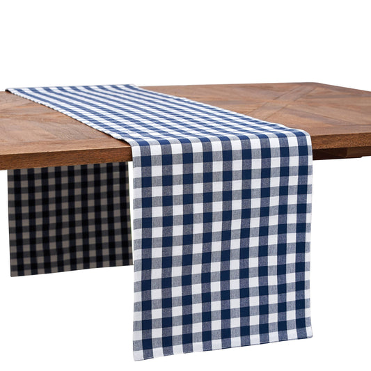 Blue and white checkered table runner on a wooden table