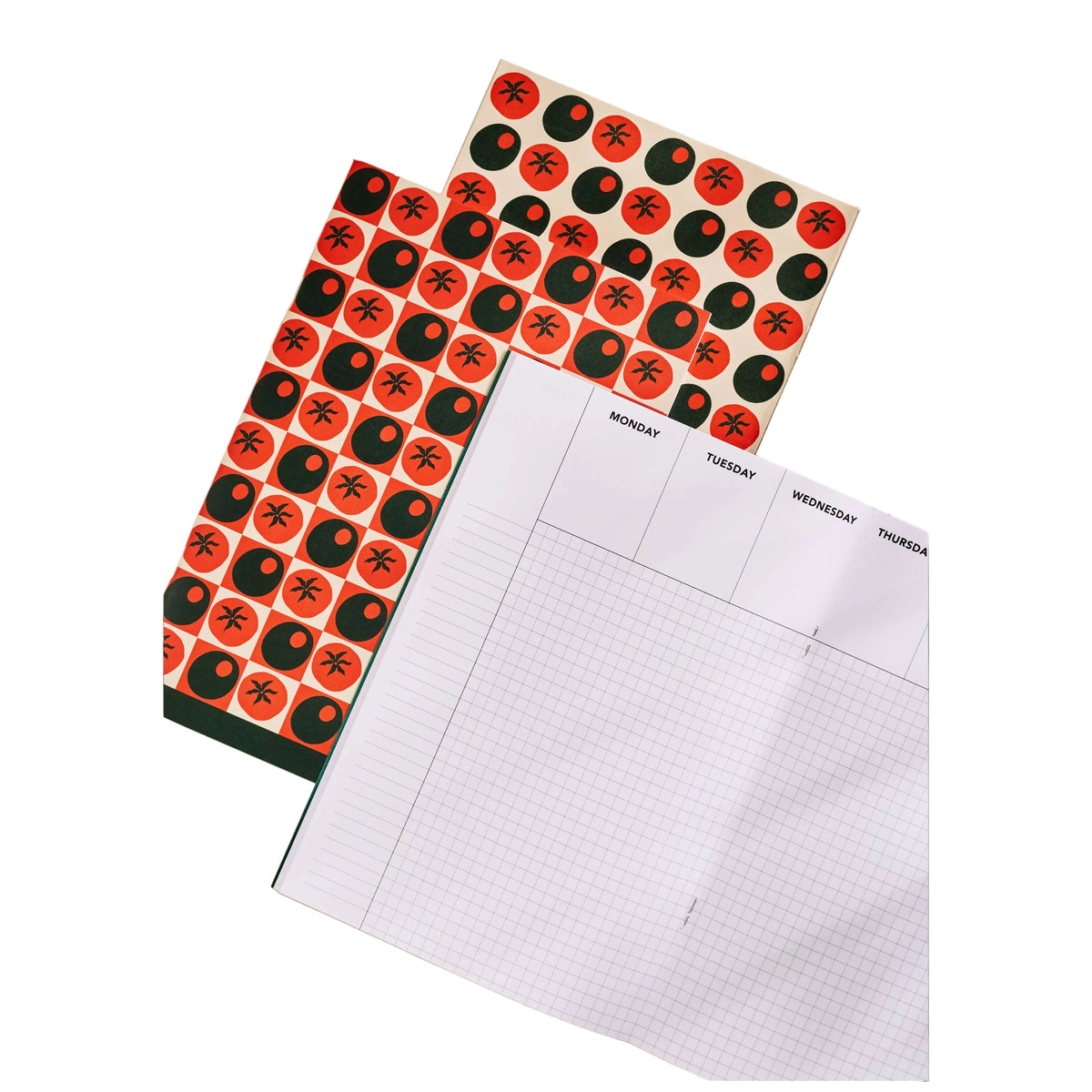 Two planners with colorful covers on a beige surface