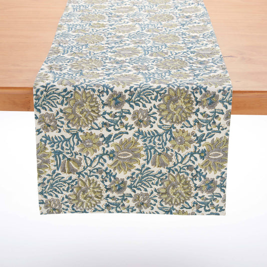 Floral patterned table runner on a wooden table