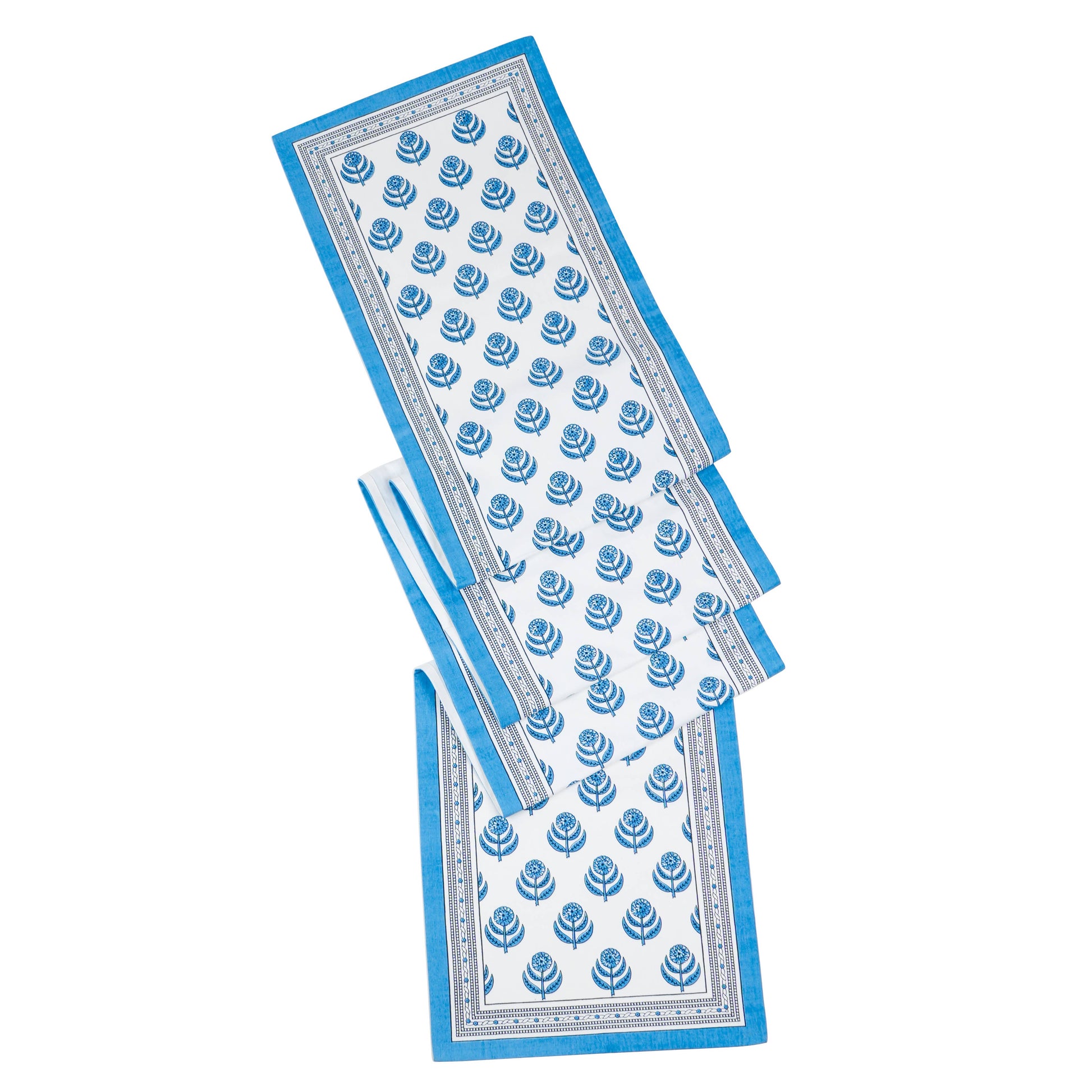 Set of three decorative paper mats with blue floral patterns on a white background
