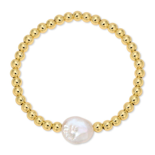 Gold beaded bracelet with a central pearl on a white background