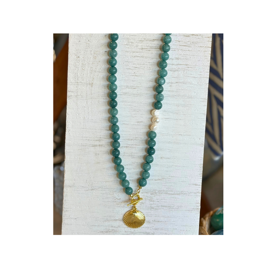 Love and Clay necklace design. Green and pearl necklace with gold shell pendant and clasp.
